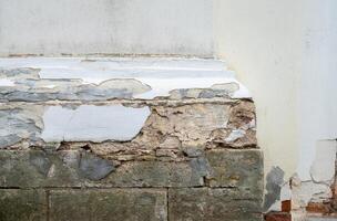 Fragment of the wall of an ancient temple with columns. Selective focus photo