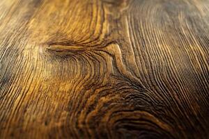 Detailed close-up of textured wooden surface showcasing grain patterns under soft lighting photo