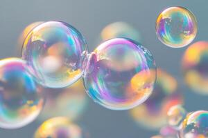 Colorful soap bubbles floating gently in the air during a bright sunny day photo