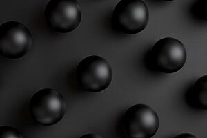 Black matte balls pattern on a dark background. Modern, minimalist, abstract design. Concept of innovation and creativity photo