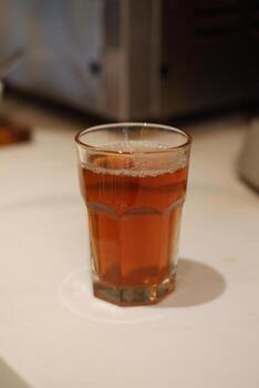 hot tea in glass on table. Selective focus and shallow depth of field. photo