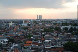 Panoramic view of city at sunset photo