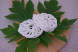 Fresh made Prawn Crackers on leaf photo