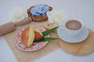 Kue Pukis or pukis cake made from flour eggs yeast and coconut milk. photo