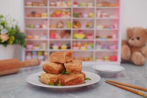 Tahu Bakso, Indonesian traditional snack made from tofu and beef. Served in white plate. photo