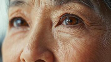 An older woman with brown eyes photo