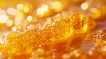 Close up of a golden liquid with bubbles photo