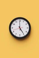 Circle clock with hour and minute hands on the background. Concept of management time, working hours and alarm clock notification. 3D illustration, vertical photo