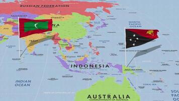Papua New Guinea and Maldives Flag Waving with The World Map, Seamless Loop in Wind, 3D Rendering video