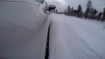 Back View Of White Car Extreme Racing On The Snow Road Onboard video