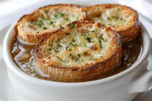French onion soup with melted cheese photo