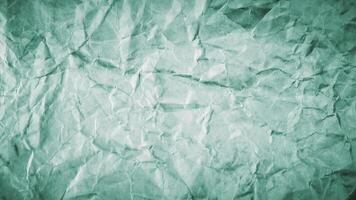Crumpled paper background with green color video