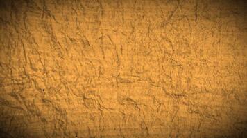 A brown paper texture background with a black background video