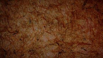 Wrinkled plastic animation, grunge textured background A brown wall with some paint on it video
