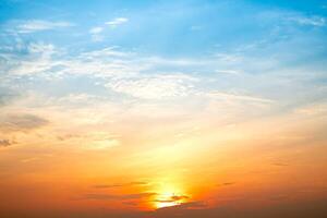 Beautiful , luxury soft gradient orange gold clouds and sunlight on the blue sky perfect for the background, take in everning,Twilight, Large size, high definition landscape photo