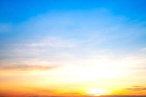 Beautiful , luxury soft gradient orange gold clouds and sunlight on the blue sky perfect for the background, take in everning,Twilight, Large size, high definition landscape photo