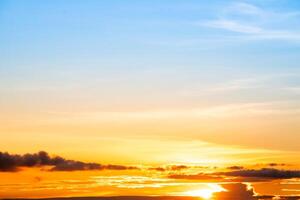 Beautiful , luxury soft gradient orange gold clouds and sunlight on the blue sky perfect for the background, take in everning,Twilight, Large size, high definition landscape photo
