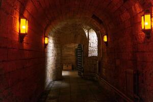 underground passage, tunnel in an ancient castle photo
