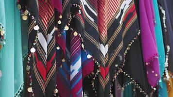Explore the world of vibrant patterned fabrics that feature unique and decorative elements video