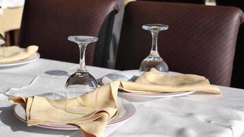 Elegant dining table setting with beautiful glassware and stylishly arranged napkins video