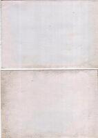 Interesting texture of old paper, soiled and damaged, as well as darkened by time and use, on a white background. Unique vintage texture of old paper which is approximately 60-70 years old. photo