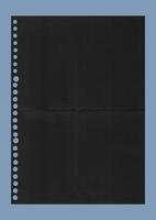 Black Paper in Dots Pattern. Paper texture background, grid book , dot paper photo