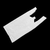 close up of a used white plastic bag on white background photo