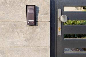 Metal gate with security intercom system photo