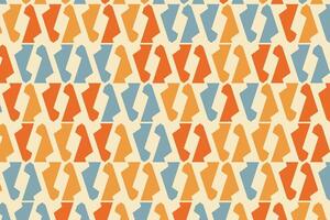 A pattern with orange, blue and white shapes vector