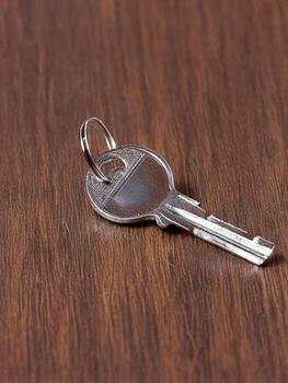 new key on wood photo