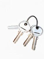 new keys on white background photo