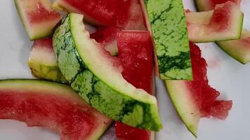 Close up of watermelon rinds, symbolizing summer refreshment and perfect for Fourth of July or picnic themed imagery video