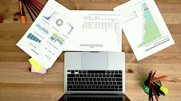Hands, writing and learning in notebook for classroom research, project ideas and brainstorming of statistics. People, university students and college notes of graphs and charts solution or studying. video