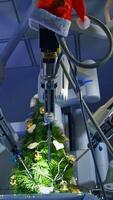Gaze at the precise work of the Da Vinci system while decorating the fur-tree. Hi-tech robotic system in the modern surgery room. View from below. Vertical video