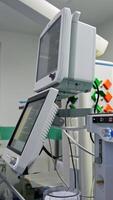 Modern apparatuses and other equipment working in the modern surgical theatre. Empty operational room in present day clinics. Vertical video