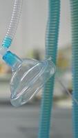 Oxygen mask for patient during operations. Close up. Modern equipment in surgery room. Blurred background. Vertical video