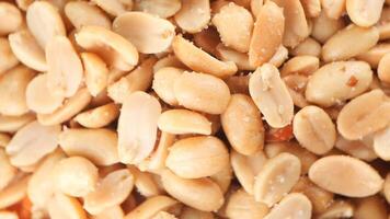 A CloseUp of Raw Shelled Peanuts Perfect for Culinary and Snack Use in Various Dishes video