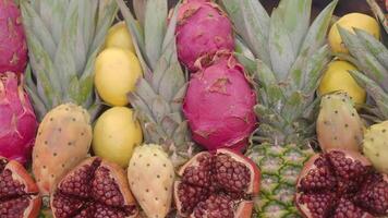 A Colorful and Diverse Assortment of Exotic Fruits featuring Pineapples and Dragon Fruits video