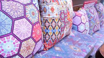Colourful cushions on display for sale in a traditional Turkish Bazaar. video