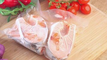 Vacuum Packaging Fresh Salmon Fillets Served with a Delightful Array of Vegetables video