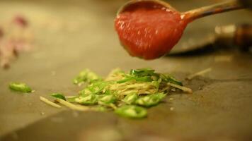 chef preparing food chilli and tomatoes video