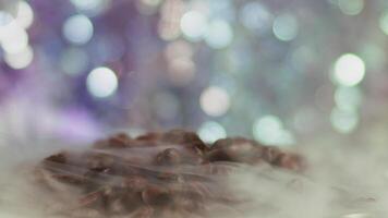 Raw Fresh Coffee Beans in Smoke and Colorful Bokeh Background video