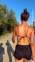 Embracing an Active Lifestyle Enjoying a Relaxing Summer Walk in Stylish Athletic Wear video