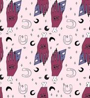 seamless pattern with witch's hands, moons and horseshoes. vector