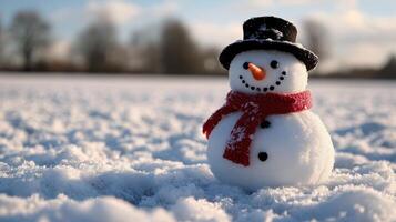 Happy snowman with a top hat and red scarf stands in a snowy field on a sunny winter day. Festive background with copy space for winter and Christmas concepts. photo