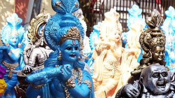 Colorful mythological sculptures displayed in a handicraft shop photo