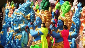 Colorful mythological sculptures displayed in a handicraft shop photo