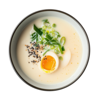 Hot bowl of cream ramen soup with noodles and tofu, egg in rich broth on isolated cut on transparent background. Japanese ramen soup with enoki mushrooms, wakame seaweed and green onions, Asian food. png