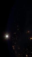 Sphere of nightly Earth planet in outer space, vertical video