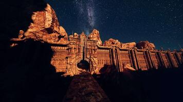 A large structure with a star filled sky in the background video
